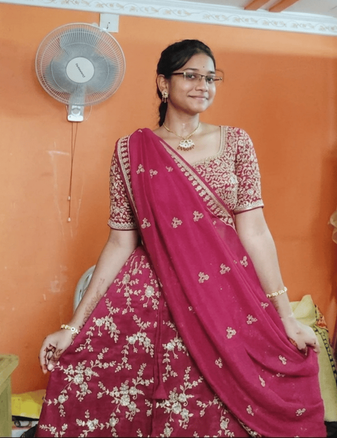 Jayani Bai in an embroidered red saree